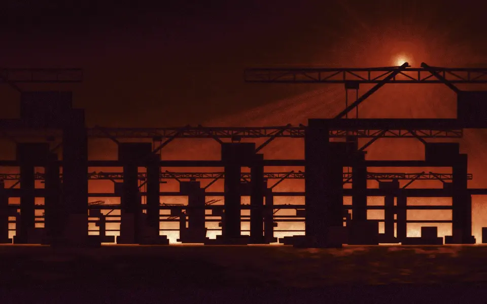 Industrial towers and cranes against an orange dusk